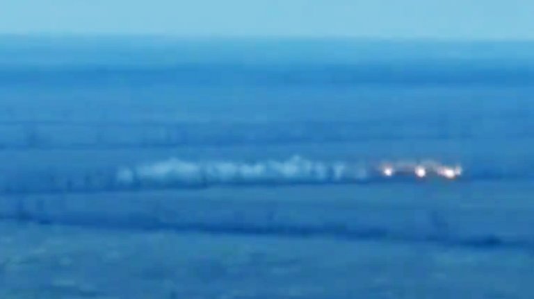 Drone capture shows the detonation of a purported standoff guided version of the RBK-500 cluster bomb in Ukraine.