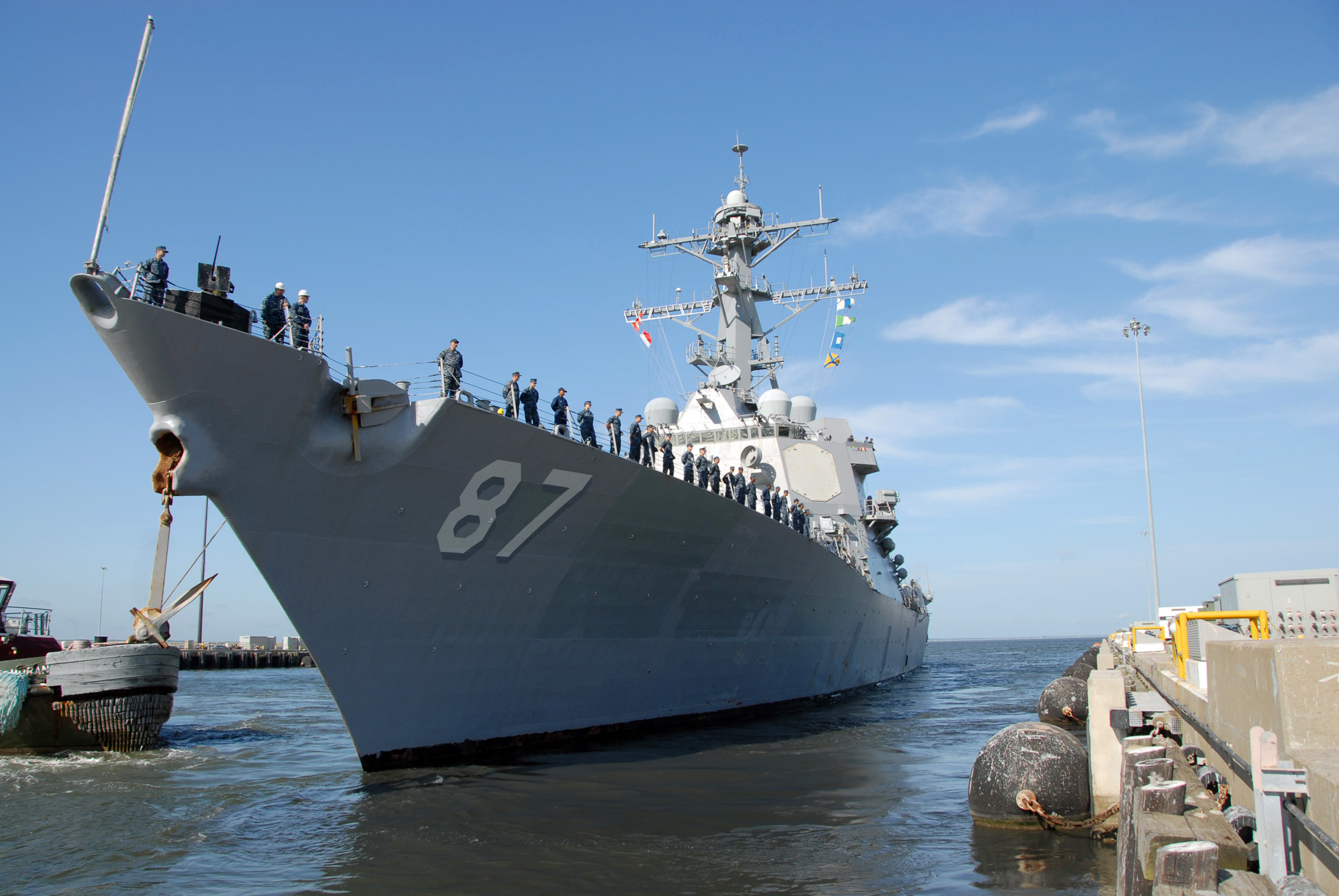 A new automated chemical warfare agent detection capability that successfully passed operational tests aboard guided-missile destroyer USS Mason will be installed on warships throughout the Fleet. The Navy plans to install the new system - designed to quickly alert warfighters to the presence of chemical warfare agents - on all active guided missile destroyers and cruisers, aircraft carriers, large and small deck amphibious ships, littoral combat ships and dry cargo/ammunition ships by the end of 2018. "I am excited to have the Improved Point Detection System - Lifecycle Replacement on board," said USS Mason Commanding Officer Cmdr. Adan Cruz. "As captain, I hold the responsibility for the safety of the crew and this system provides enhanced chemical warfare defense to ensure our sailors will return home safely." The USS Mason is pictured departing Naval Station Norfolk. (U.S. Navy photo by Petty Officer 2nd Class Eric S. Garst)